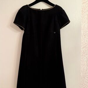 CHANEL Elegant Black Mini Dress with Gold Accents